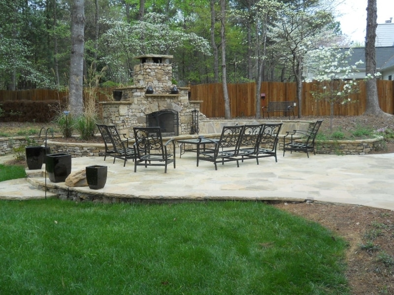 Residential landscaping. Patio with fireplace landscaping company