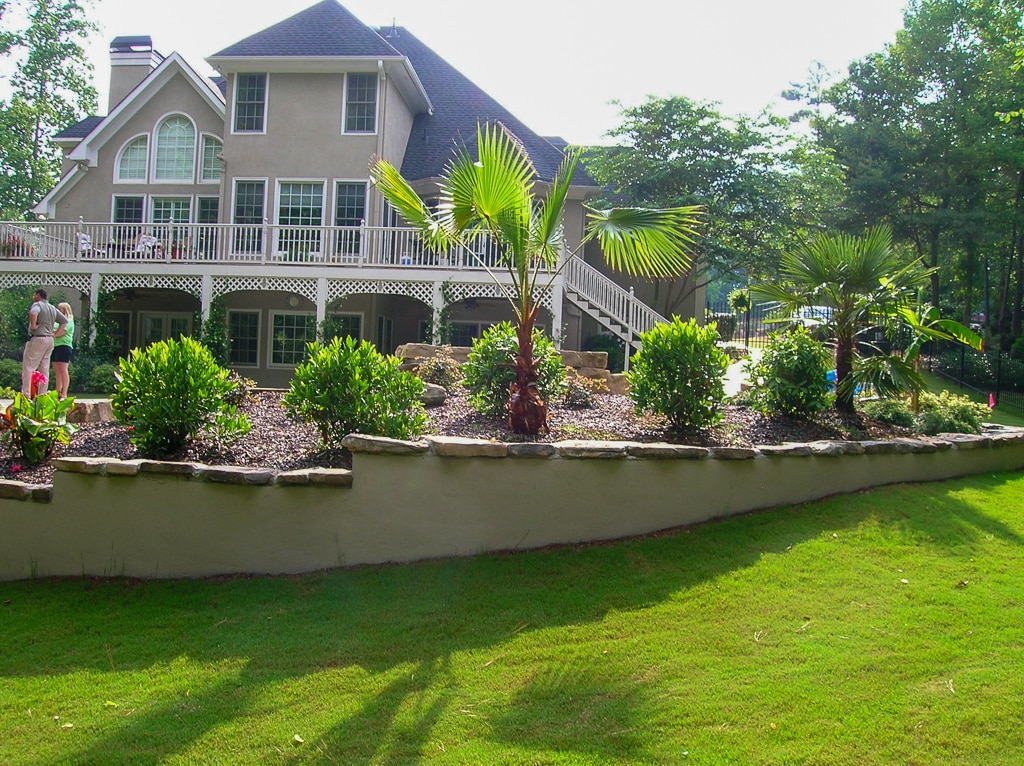Residential landscaping. Retaining wall and lawn